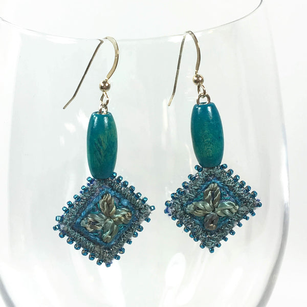 blue hand stitched flower earrings