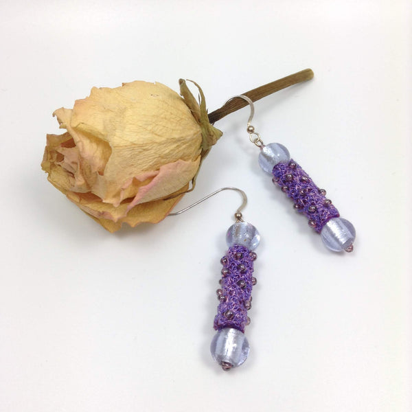 Artisan dangle drop earrings with mauve fibre art tube beads by textile artist Tors Duce