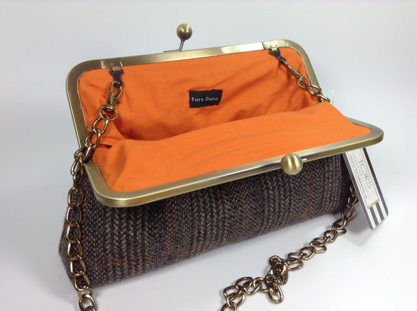 Cotton orange lining and brass chain strap on Scottish wool bag