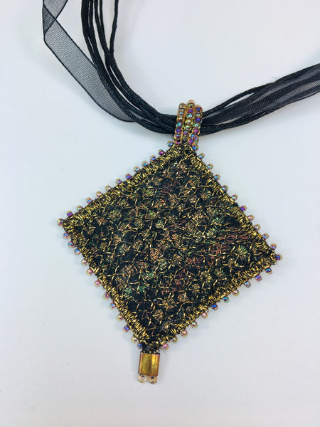 Black & gold square pendant on ribbon necklace