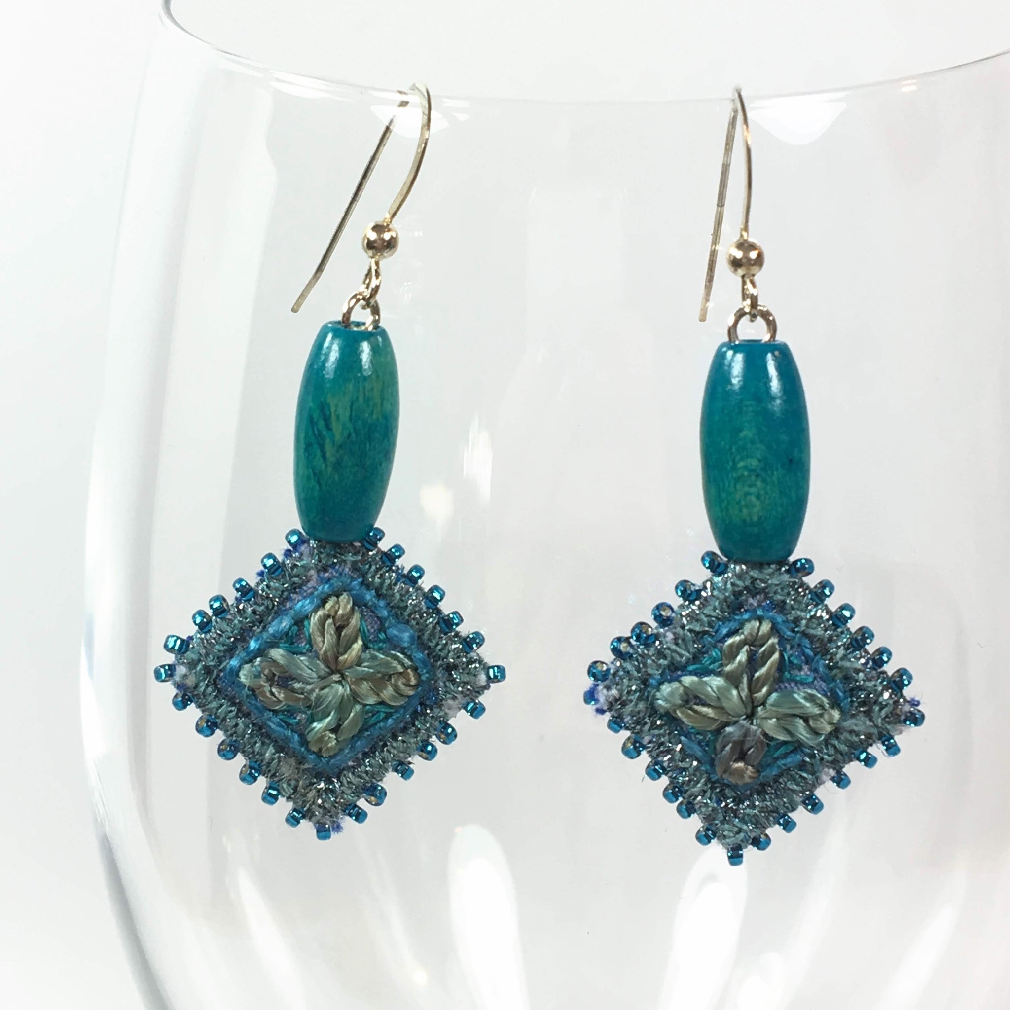 Embroidered blue dangle drop earrings
